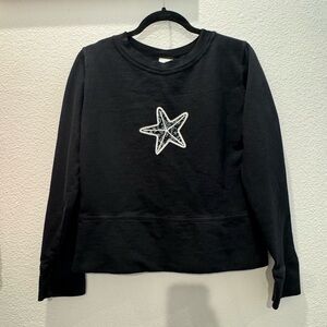 Black long-sleeved lightweight sweatshirt w/ white, starfish graphic on front